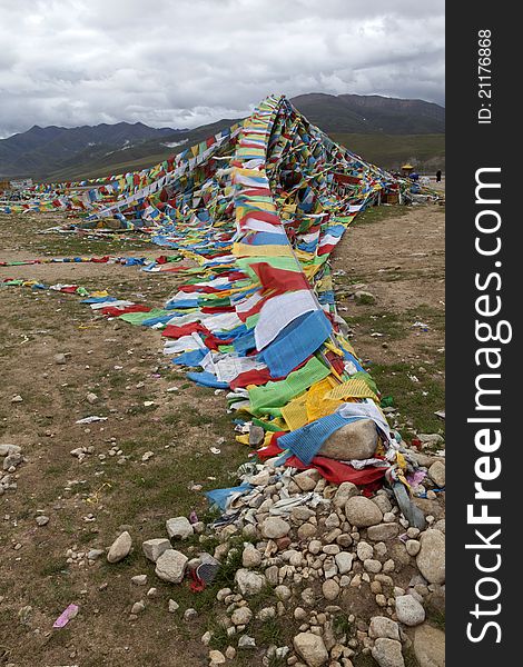 Tibetan Five-Color Flag and Mani Stone