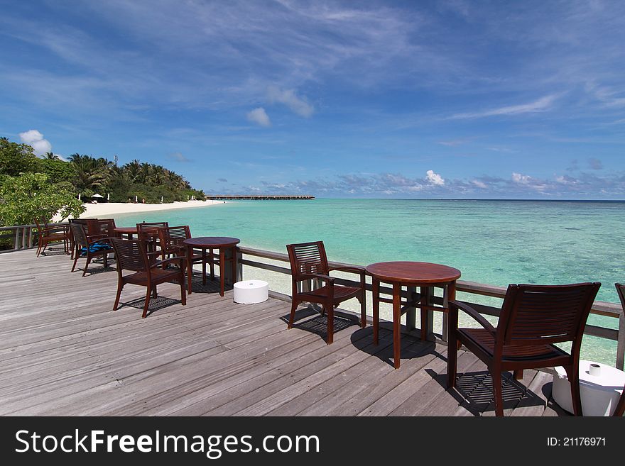 Chairs And Desk Near The Beach, Maldives