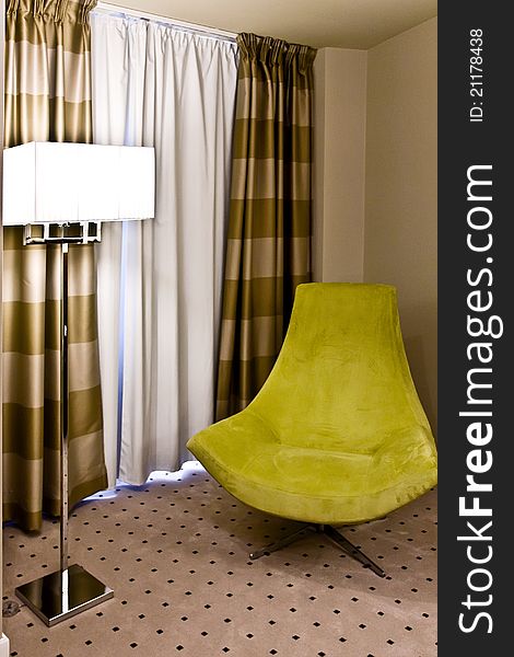 White lamp with yellow armchair. White lamp with yellow armchair