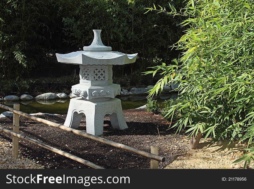 Details of a japanese lantern in zen garden