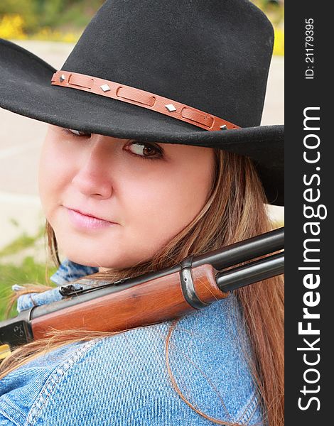 Pretty Cowgirl with 30-30 Rifle