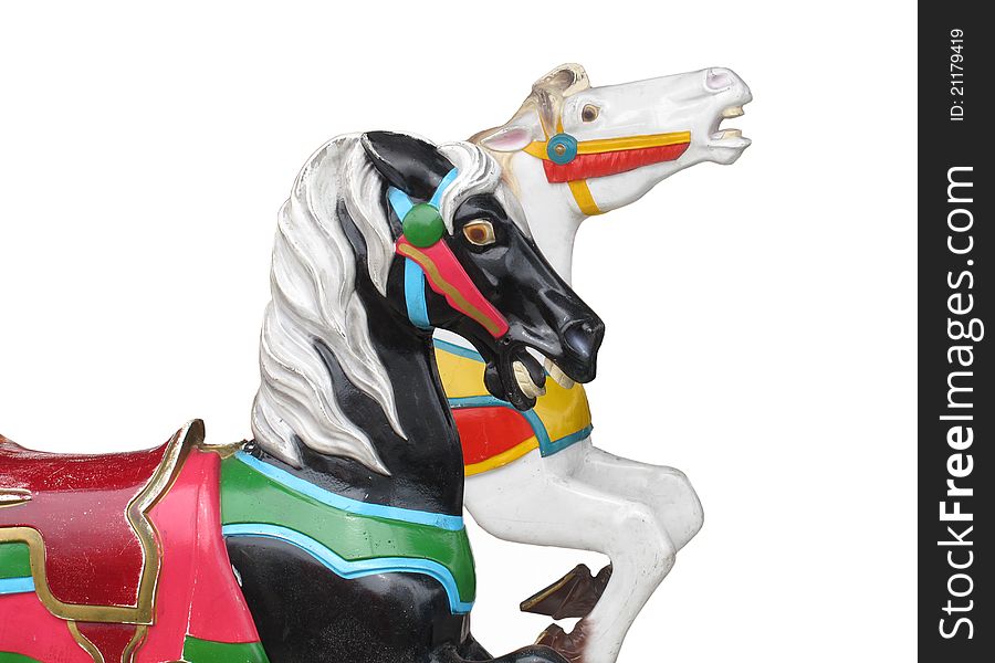 Two horse heads from a carrousel