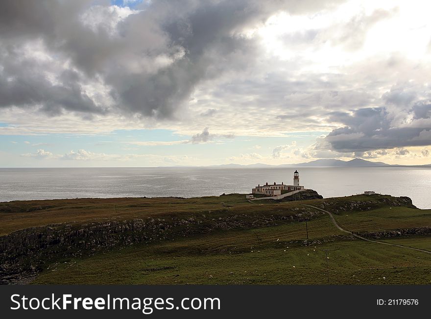 Cliffs and Neist Point lighthouse, scotland. Isle of skye during summer holidays. It's the place for the film breaking the waves. Cliffs and Neist Point lighthouse, scotland. Isle of skye during summer holidays. It's the place for the film breaking the waves.