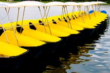 Row Of Yellow Watercycles Royalty Free Stock Photo Row Of Yellow Watercycles Royalty Free Stock Photo