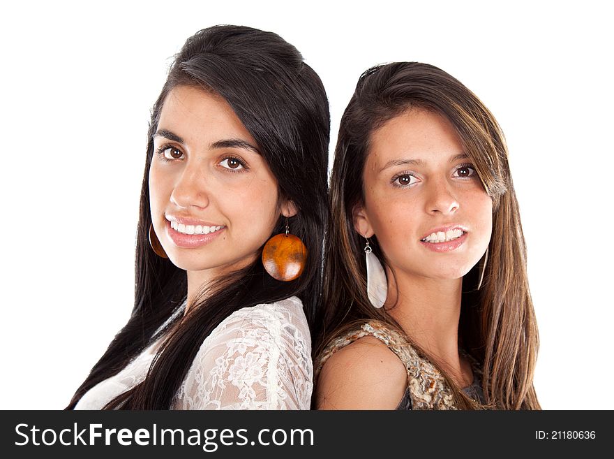 Two beautiful young women over white