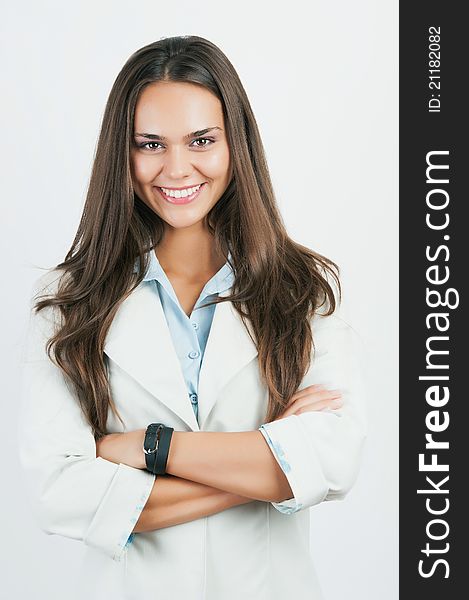 Portrait of happy smiling young cheerful business woman, on white background