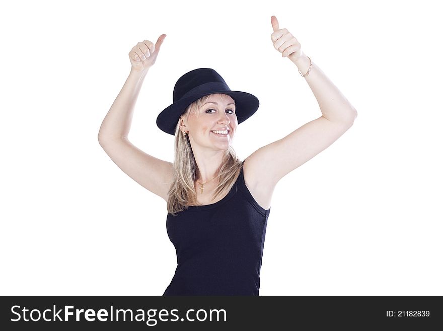 Young woman in hat showing hands ok sign