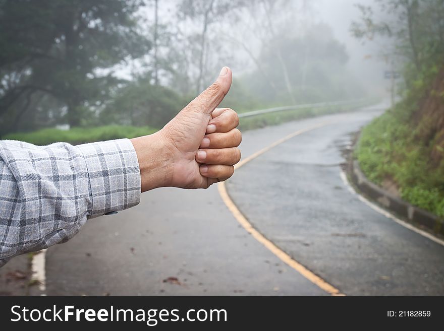 Hand Of Hiker Man At Rural