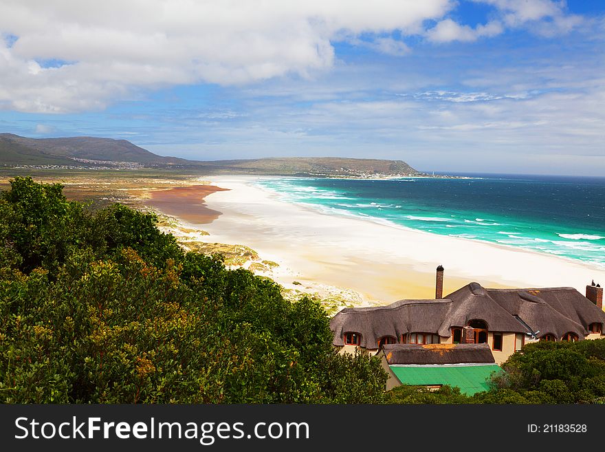 Marvellous beach and lonely house in South Africa - horizontal