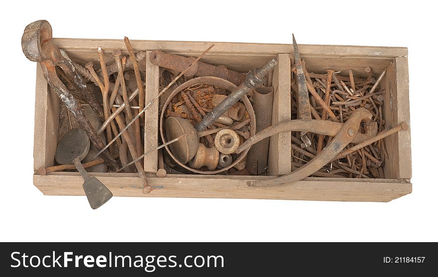 Antique rusty tools on an old wooden desk