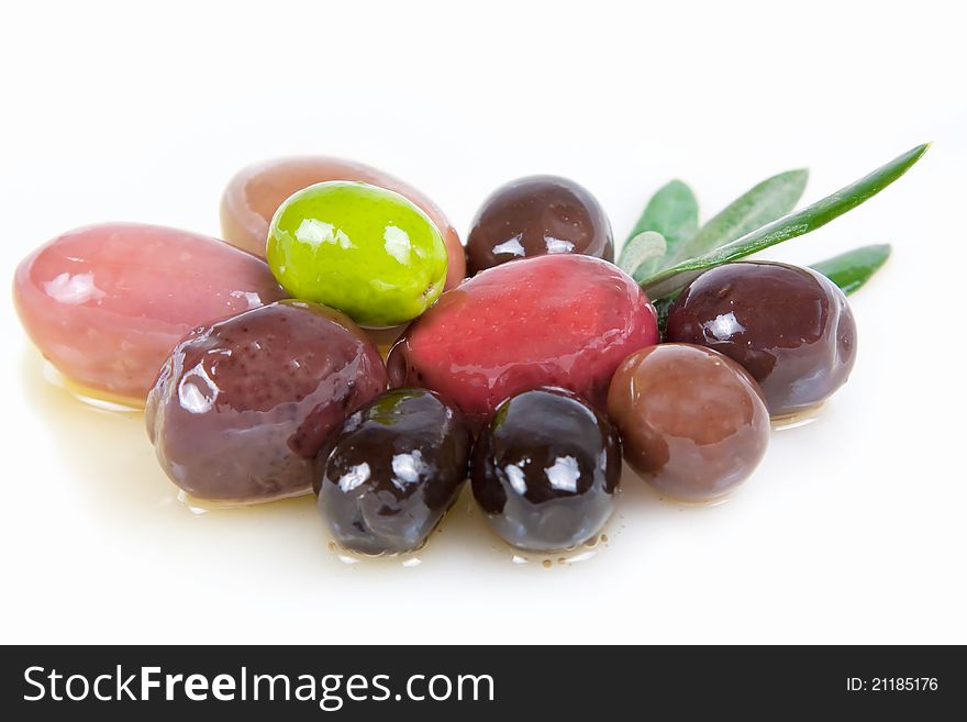 Various types of olives on white background. Various types of olives on white background
