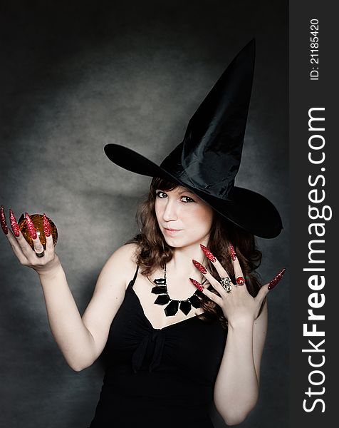 Witch With Crystal Ball In Hand