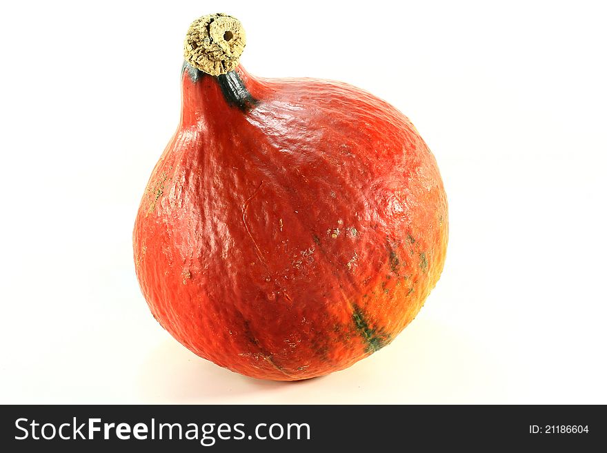 A Hokkaido pumpkin on a white background