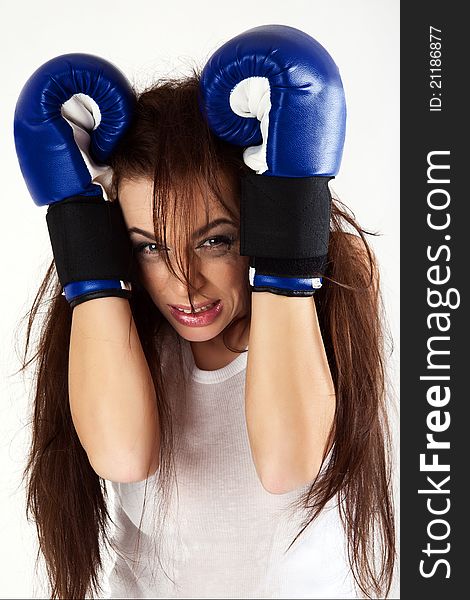 Young beautiful woman during fitness time and boxing. Young beautiful woman during fitness time and boxing.
