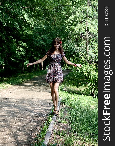 Girl walking outdoor in summer