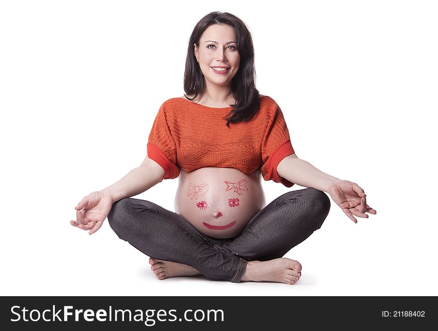 A pregnant woman with a picture on the belly isolated on white