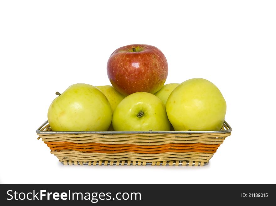 Apples in a basket on a white background. Apples in a basket on a white background