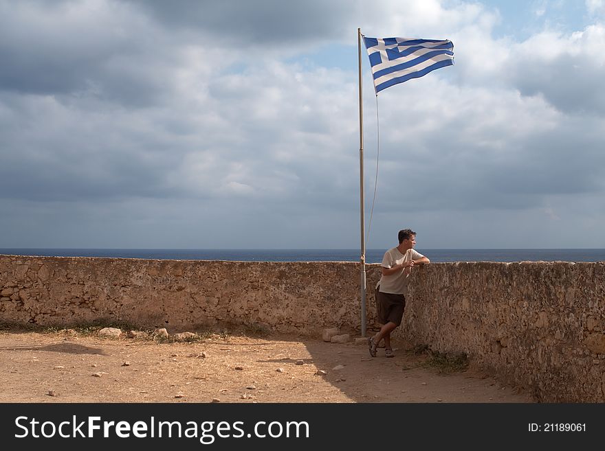 Youth On Stone Castle Under The Greece Flag