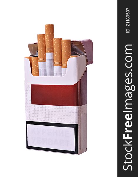 Open pack of cigarettes on a light background