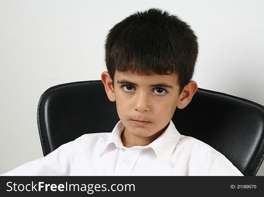 Portrait of happy little boy over white background. Portrait of happy little boy over white background