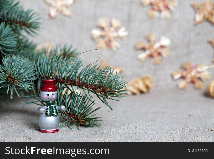 The Christmas multi-colored wooden snowman