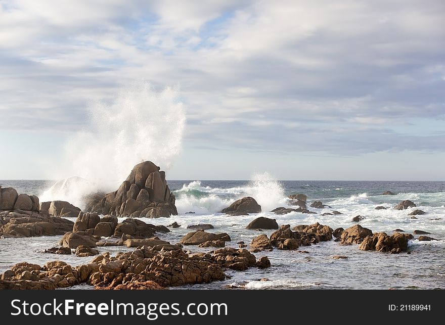 Sea rock is breaking powerful wave