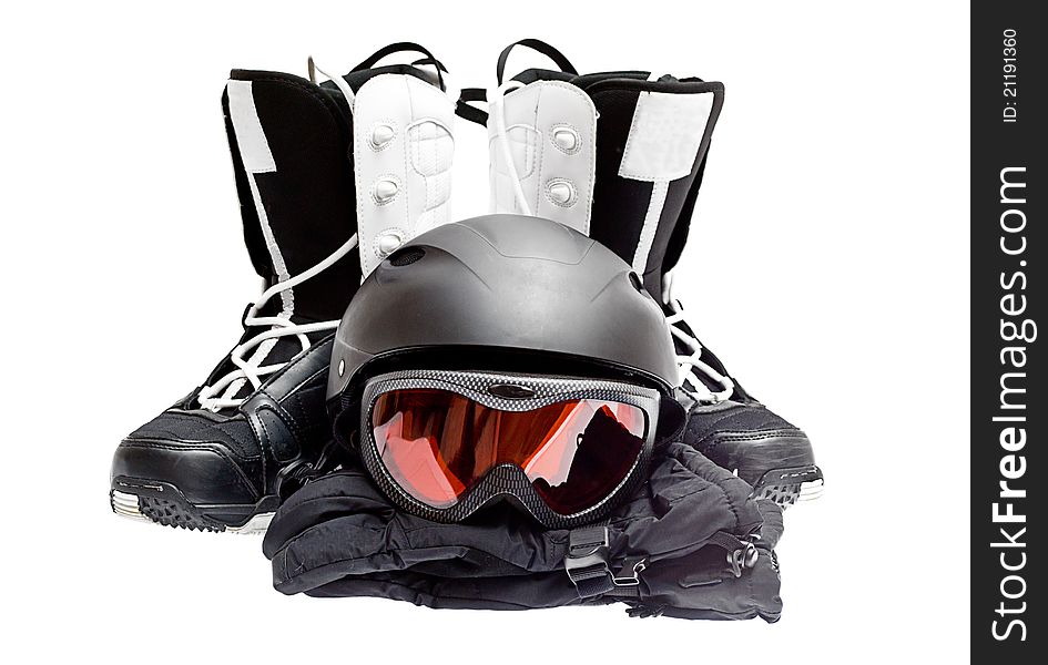 Snowboard boots, helmet, gloves, glasses on a white background.