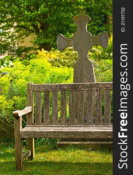 Rustical bench in blossom graveyard. Bristol, May 2011