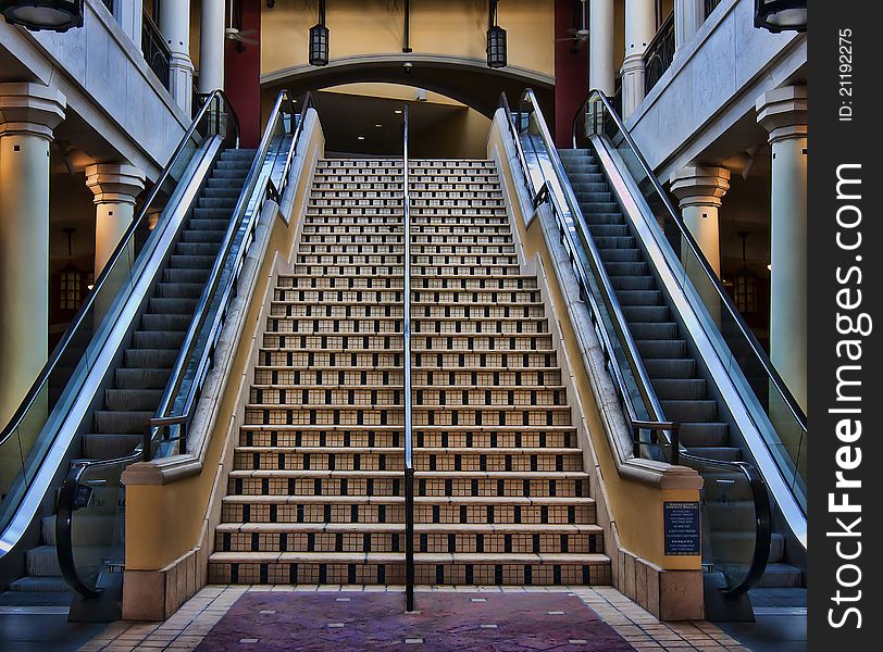 Two escalators and a large Spanish tile staircase. Two escalators and a large Spanish tile staircase