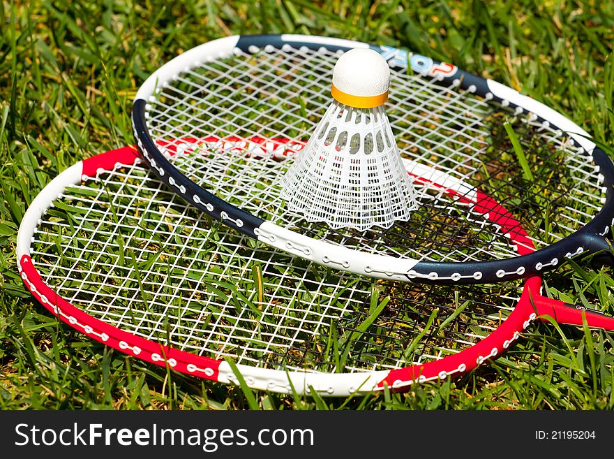 Two Badminton Rackets And Shuttlecock Closeup