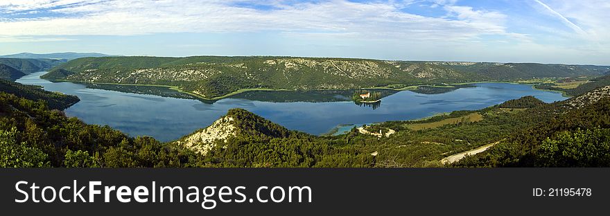 Panorama of Krka river and the island and monaster