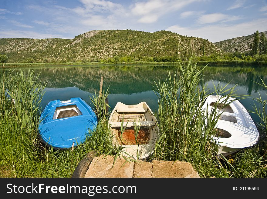 River boats berthed on a pier in the National park Krka. River boats berthed on a pier in the National park Krka