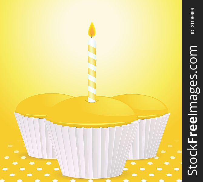 Yellow cupcakes, one with birthday candle on a yellow polka dot background. Yellow cupcakes, one with birthday candle on a yellow polka dot background