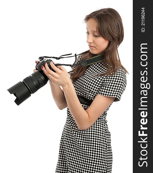 Young beautiful girl with the camera isolated on a white background. Young beautiful girl with the camera isolated on a white background