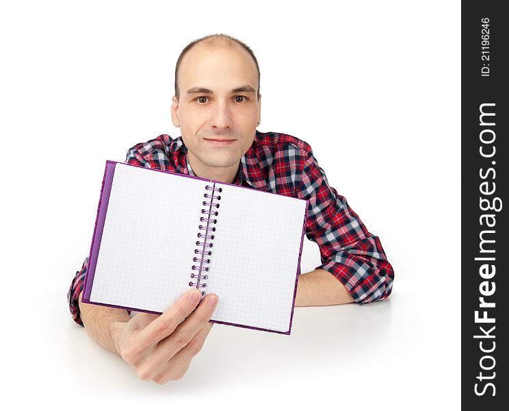 Bald young man showing notepad