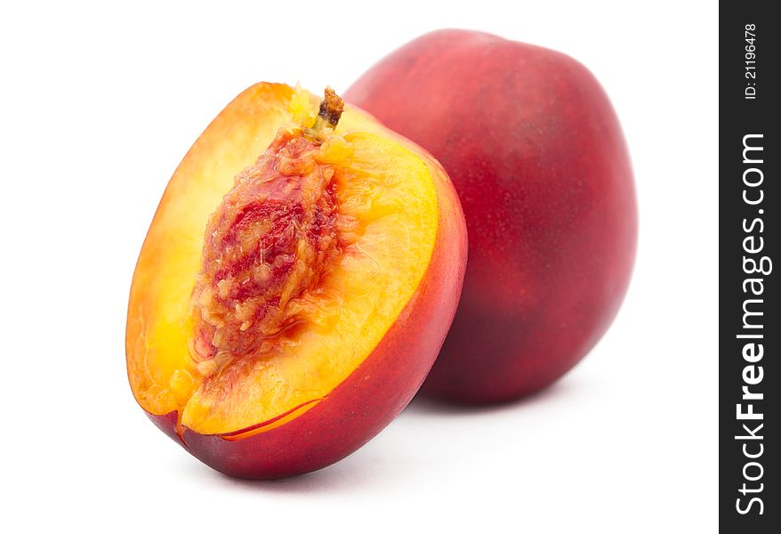 Juicy peach on a white background