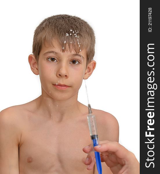 The boy and the syringe. Isolated on white background