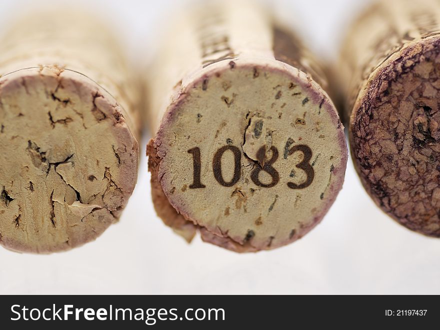 Simple studio shot of three wine corks. Focus on 1st cork, shallow DOF. Simple studio shot of three wine corks. Focus on 1st cork, shallow DOF.