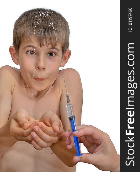 The boy and the syringe. Isolated on white background