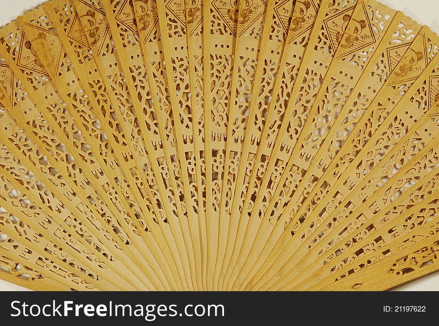 Close view of a wooden japanese fan texture