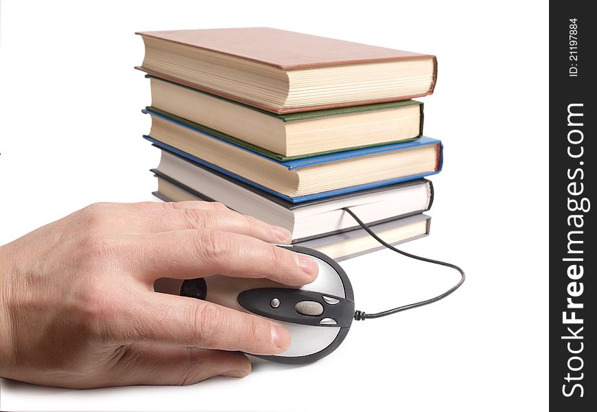 Color photo of an stack books and mouse. Color photo of an stack books and mouse