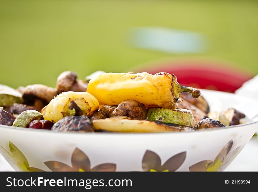 Different grilled vegetables baked in the outdoors. Different grilled vegetables baked in the outdoors