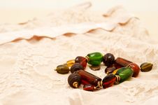 Green And Brown Bracelet Lying Stock Photo Green And Brown Bracelet Lying Stock Photo