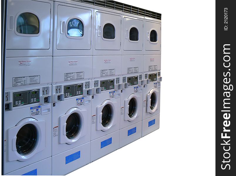 Coin operated washers and dryers in a marine laundromat, clipping path