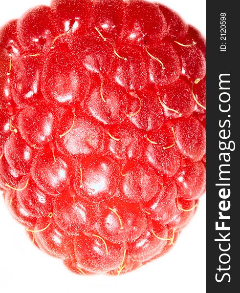 Close up of a raspberry. Isolated over white background