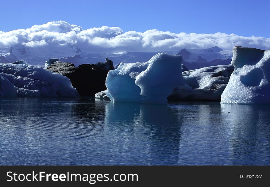 Sunlit icebergs Jokulsarlon lagoon Iceland