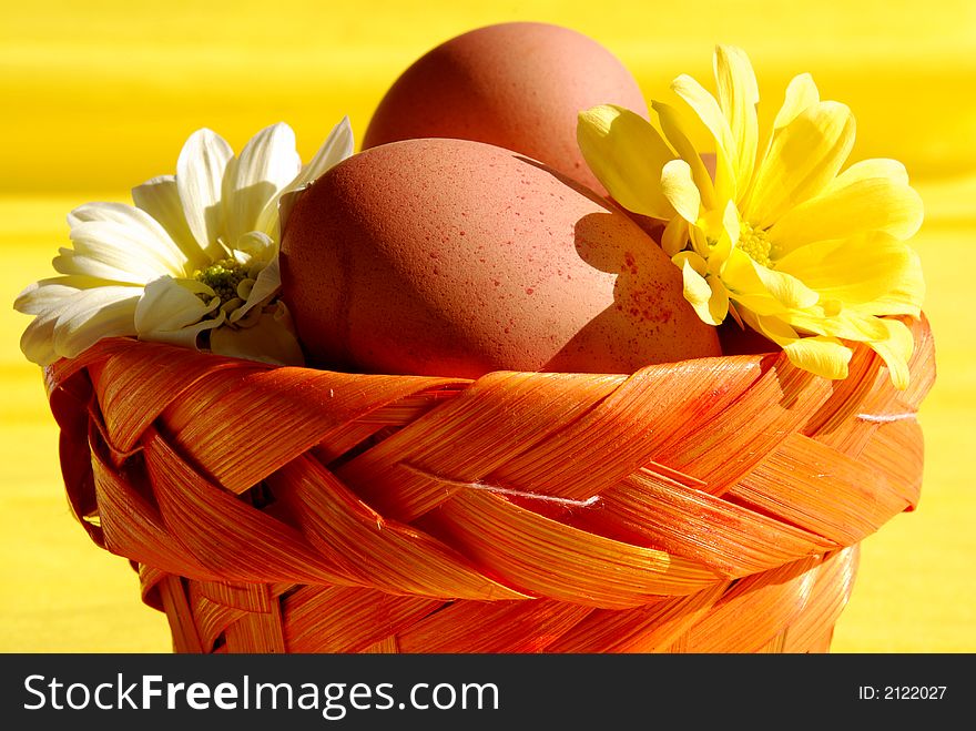 Eggs And Flowers In Basket