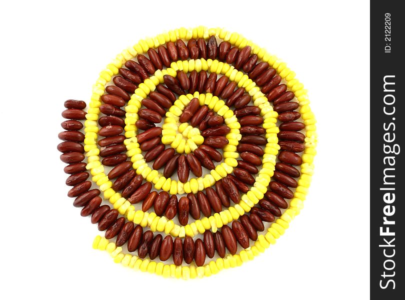 Top view at spiral made from sweet corn and red beans. Top view at spiral made from sweet corn and red beans