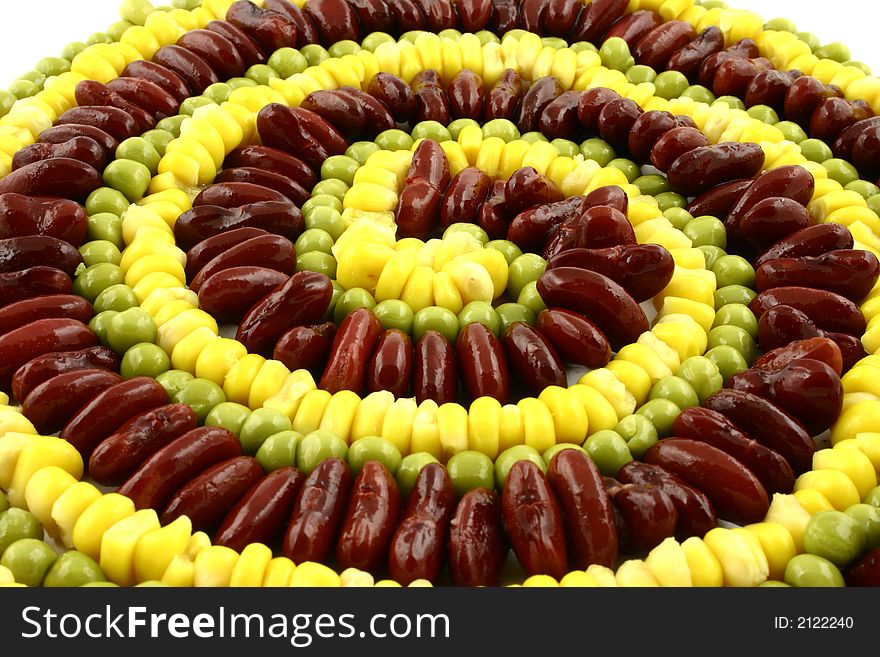 Colorful spiral made from green peas, sweet corn and beans. Colorful spiral made from green peas, sweet corn and beans