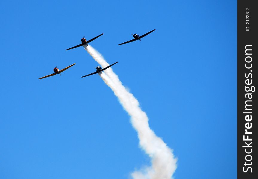 Four jets flying in formation at airshow. Four jets flying in formation at airshow
